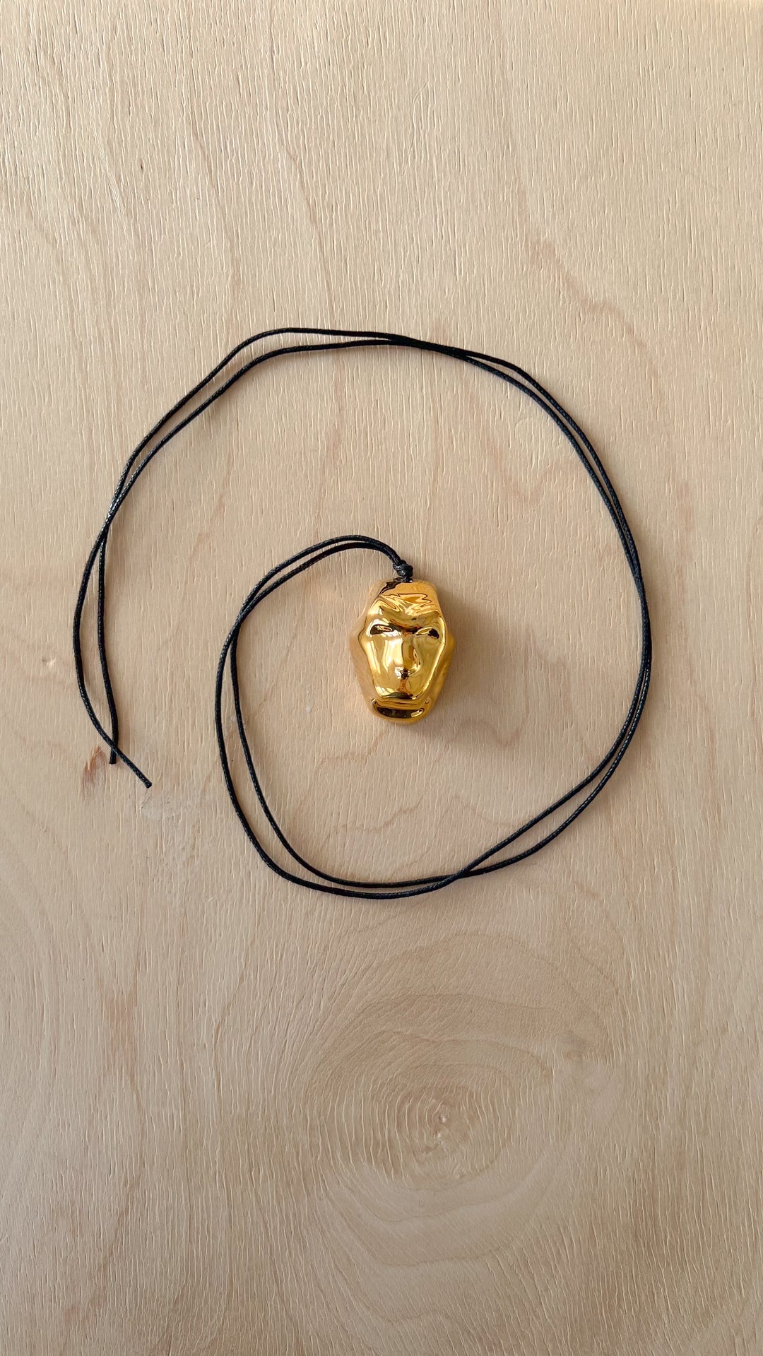Pendentif PAMFIR petit masque doré